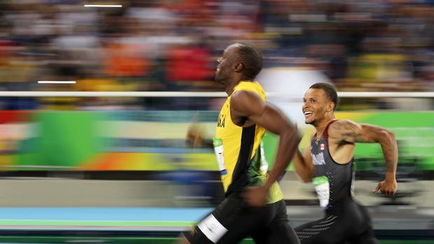 Usain Bolt and Andre De Grasse running in the Olympics